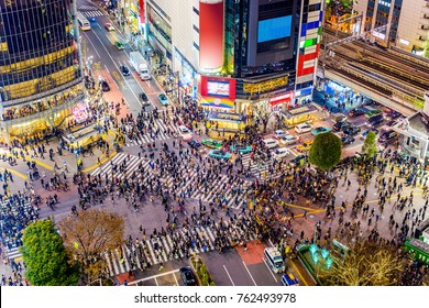 Shibuya, Tokyo, Japan crosswalk and cityscape.