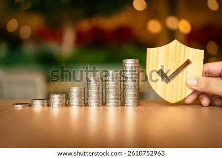 Shield protect icon with coins stack, Security protection and health insurance. The concept of family home, foster care, homeless support, protection, health care day.
