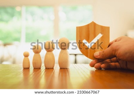 Shield protect icon and family model, Security protection and health insurance. The concept of family home, protection, health care day, car insurance.