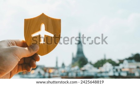 Shield protect icon with plane icon, Security protection. The concept of travel insurance, covering medical expenses, emergency medical evacuation, trip delays, trip interruptions, and lost baggage.