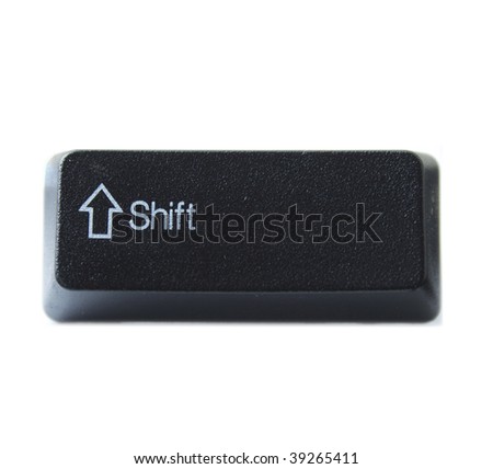 The Shift key from a black computer keyboard