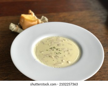 Shiitake Mushroom Soup In A Large Plate And Served On The Dining Table.