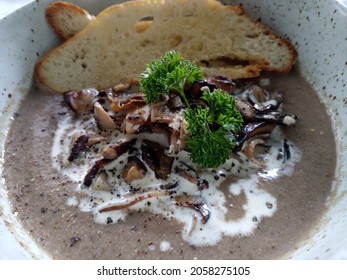 Shiitake Mushroom Soup With Toasted Bread.