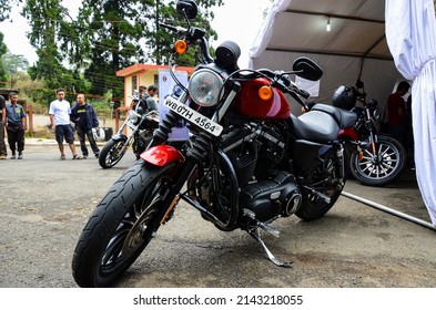 Shillong, India – October 05, 2012: Display of Harley Davidson motorbike in an exhibition. Visitors and fan of harley davidson bike enjoying watching the favorite sporty motorcycle