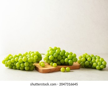 Shine Muscat, Green grapes on a cutting board 