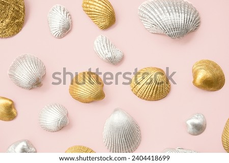 Shined cockle shells collection on pink.