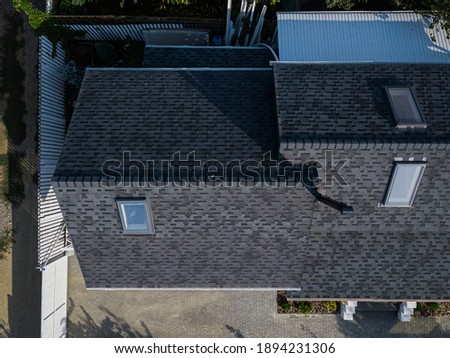 Shingles texture - close up view of asphalt roofing shingles