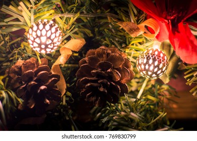 Shining bells with pinecones.