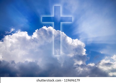 Shining Cross In The Clouds In The Blue Sky