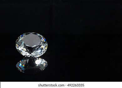 shining diamond crystal on black background, left edge position