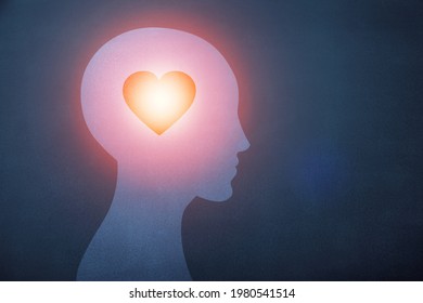 Shining Heart image in the human head. Love, instinct, and romance concept.