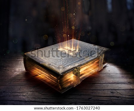 Shining Holy Bible - Ancient Book On Old Table
