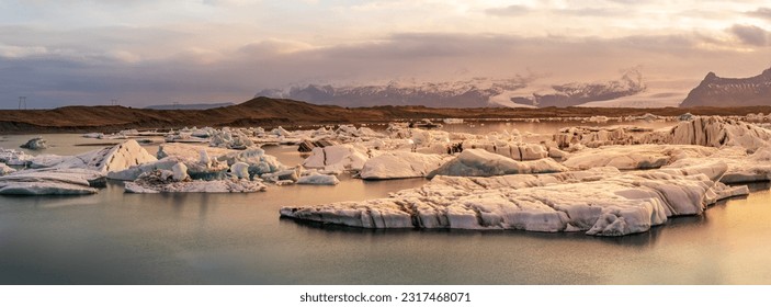 Shining pieces of ice in the Diamond Beach of Iceland - Powered by Shutterstock