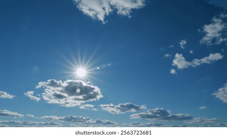 Shining sun rays and eventually breaking through cloud mass. Clouds beautiful sky sunbeams cloud open air. Timelapse.