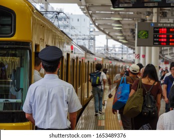 Shinjuku, Japan - 2 9 19: The Seibu-shinjuku Line Train Pulling Into A Busy Station