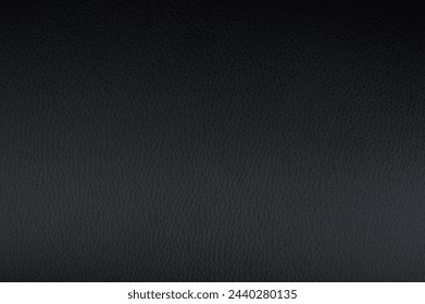 Shiny black leather pattern background macro close up view