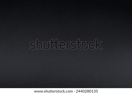 Shiny black leather pattern background macro close up view
