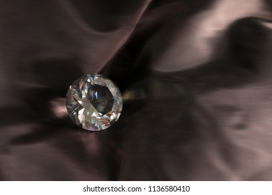 Shiny diamond on dark background. Shiny diamond in concept of luxury. - Shutterstock ID 1136580410
