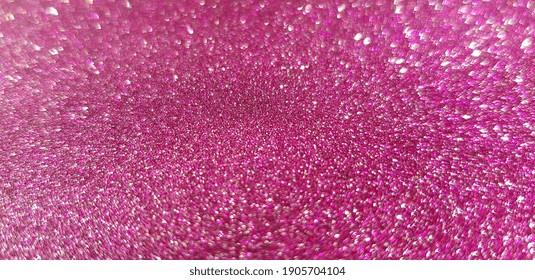 Shiny glitter pink paper on light (angle, texture).
