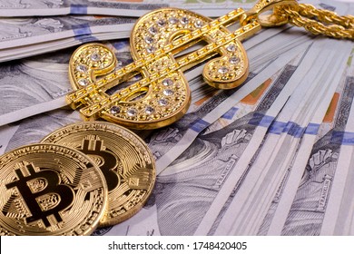 Shiny Gold Dollar Sign Necklace And Physical Bitcoin On A United States Dollar Bills. Financial Business Background.