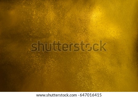 Shiny golden textured paper sheet background