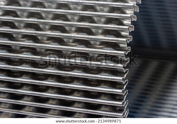 shiny\
metal corrugation. bent aluminum foil for\
radiator
