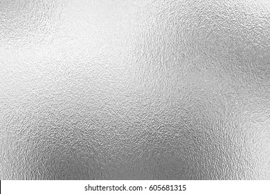 Shiny metal silver foil texture for background.