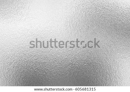 Shiny metal silver foil texture for background.