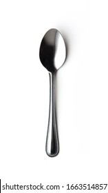 Shiny metal spoon isolated on a white background