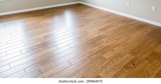 A Shiny, Polished Hardwood Floor In A New Home