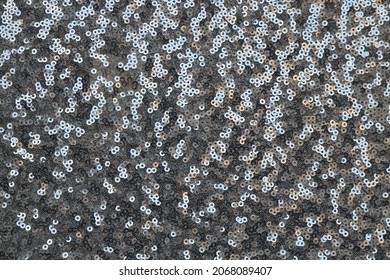 shiny round silver sequins pattern - closeup background texture for festive events and galas
