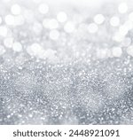 Shiny silver glitter as background. Bokeh effect