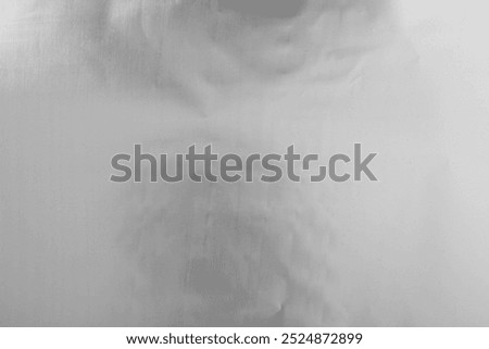 Shiny silver tinfoil surface as background, top view