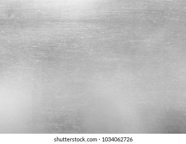 Shiny stainless steel plate. - Shutterstock ID 1034062726