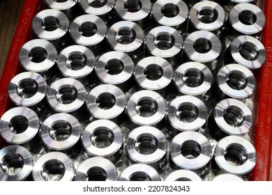 Shiny steel parts background. Regular industrial metal production pattern with selective focus.High precision steel automotive parts manufacturing by innovative CNC machining
 - Shutterstock ID 2207824343