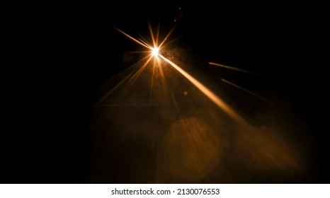 Shiny Sun, Sunbeams, Sunrays, Sunshine Design. Yellow Warm Light Effect, Sun Rays, Golden Beams Isolated On Black Background. Star Dust