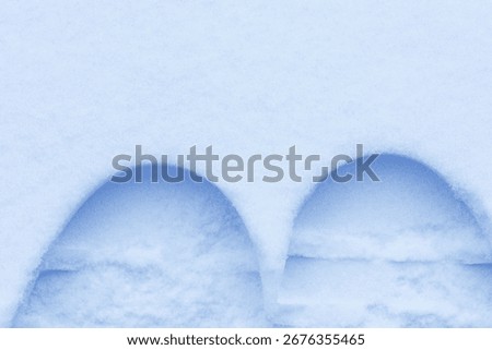Shiny white snow texture on a winter sunny day. Tillable snow texture.