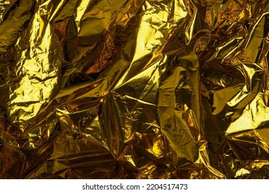 Shiny yellow gold foil abstract texture background - Shutterstock ID 2204517473