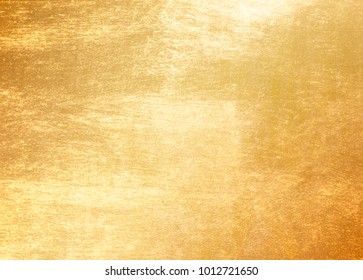 Shiny yellow leaf gold foil texture background - Shutterstock ID 1012721650