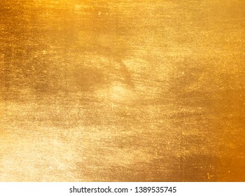 Shiny yellow leaf gold foil texture background - Shutterstock ID 1389535745