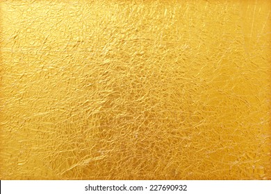 Shiny yellow leaf gold foil texture background - Shutterstock ID 227690932