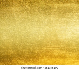 Shiny yellow leaf gold foil texture background - Shutterstock ID 561195190