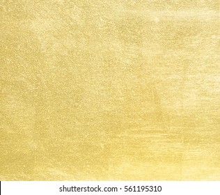 Shiny yellow leaf gold foil texture background - Shutterstock ID 561195310