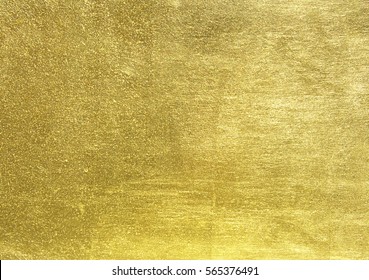 Shiny yellow leaf gold foil texture background - Shutterstock ID 565376491