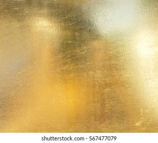 Shiny yellow leaf gold foil texture background - Shutterstock ID 567477079
