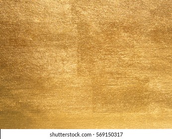 Shiny yellow leaf gold foil texture background - Shutterstock ID 569150317