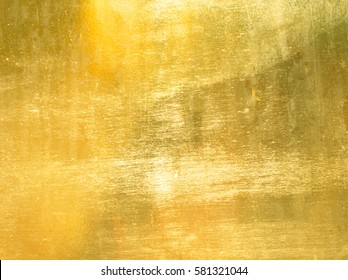 Shiny yellow leaf gold foil texture background - Shutterstock ID 581321044