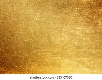 Shiny yellow leaf gold foil texture background - Shutterstock ID 633407360