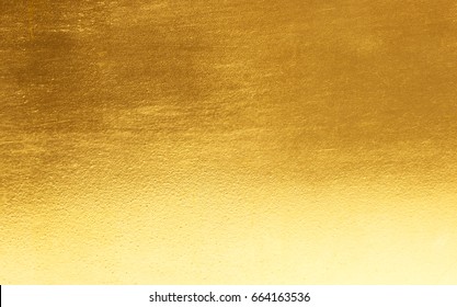 Shiny yellow leaf gold foil texture background - Shutterstock ID 664163536