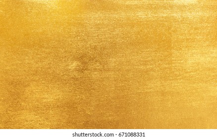 Shiny yellow leaf gold foil texture background - Shutterstock ID 671088331